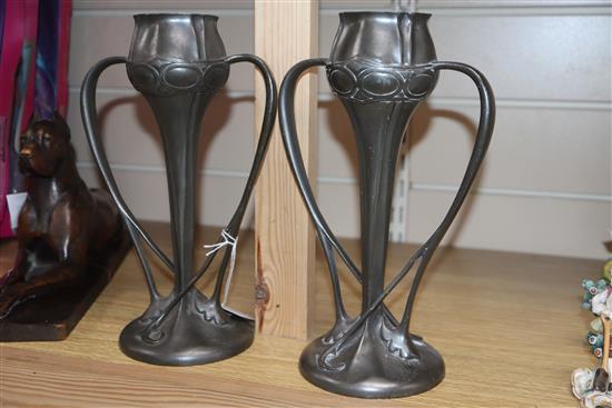 Archibald Knox for Liberty & Co., a pair of Tudric pewter vases, no. 029 H.25cm